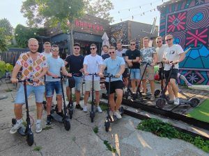 Dutch tourist riding e scooter through Belgrade city center