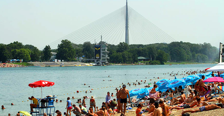 Ada Ciganlija lake beach crowded with visitors in summer in Belgrade, Serbia
